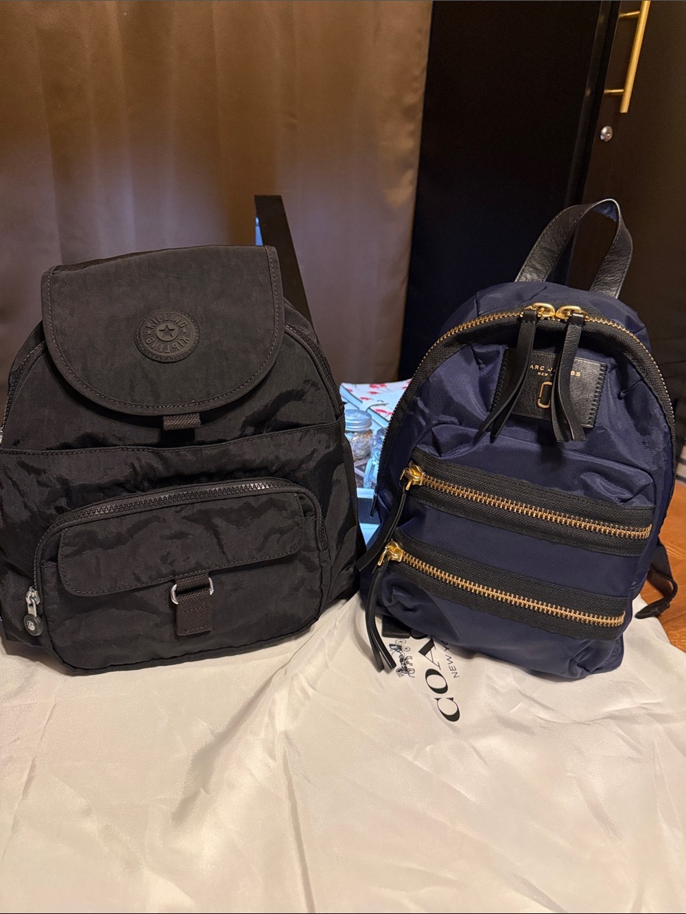 Marc jacobs!!!!Kipling Black & Navy Dual-Pocket Perfect condition both Sale!